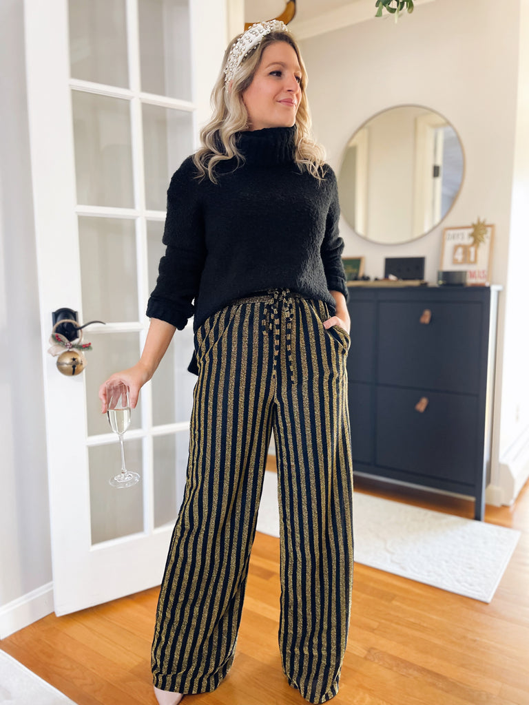 Black trousers with gold 2025 stripe